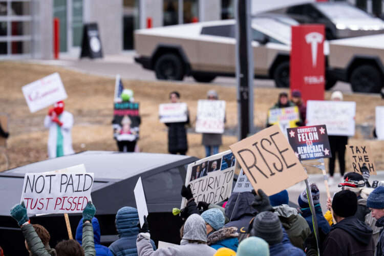 About 500 protesters outside Tesla in Minneapolis (Golden Valley) with signs reading “NOT PAID JUST PISSED”, “Tesla Funds Fascists”, “Save the VA”, “No Vet Left Behind”, Make Nazis Afraid Again” to name a few. This is the 7th weekend in a row of protests at this showroom. About 500 protesters outside Tesla in Minneapolis (Golden Valley) with signs reading “NOT PAID JUST PISSED”, “Tesla Funds Fascists”, “Save the VA”, “No Vet Left Behind”, Make Nazis Afraid Again” to name a few. This is the 7th weekend in a row of protests at this showroom.