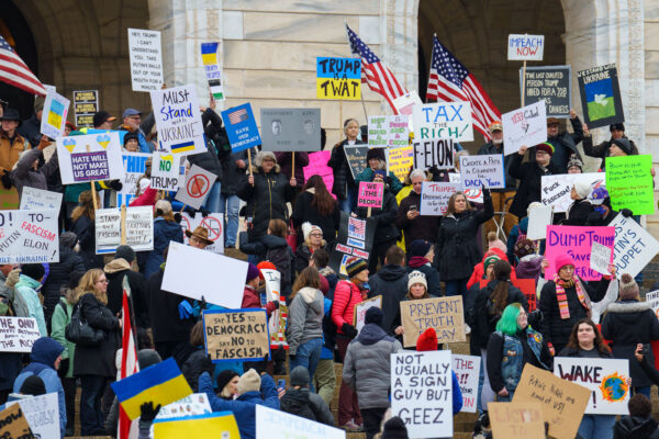 Protesters on the steps of the Minnesota State Capitol in St. Paul, Minnesota on March 4, 2025.  Taking place on the afternoon of President Trump’s first address to joint session in congress, they are protesting the actions of the Trump Administration and Elon Musk’s involvement. The protest was organized as part of the “50501” protests taking place around the country. This is the first of two planned protests this week. Another is planned for Saturday at the State Capitol. Protesters on the steps of the Minnesota State Capitol in St. Paul, Minnesota on March 4, 2025.  Taking place on the afternoon of President Trump’s first address to joint session in congress, they are protesting the actions of the Trump Administration and Elon Musk’s involvement. The protest was organized as part of the “50501” protests taking place around the country. This is the first of two planned protests this week. Another is planned for Saturday at the State Capitol.