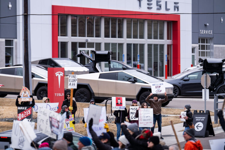 About 500 protesters outside Tesla in Minneapolis (Golden Valley) with signs reading “NOT PAID JUST PISSED”, “Tesla Funds Fascists”, “Save the VA”, “No Vet Left Behind”, Make Nazis Afraid Again” to name a few. This is the 7th weekend in a row of protests at this showroom. About 500 protesters outside Tesla in Minneapolis (Golden Valley) with signs reading “NOT PAID JUST PISSED”, “Tesla Funds Fascists”, “Save the VA”, “No Vet Left Behind”, Make Nazis Afraid Again” to name a few. This is the 7th weekend in a row of protests at this showroom.