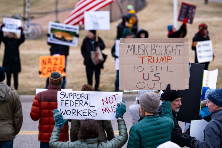 About 500 protesters outside Tesla in Minneapolis (Golden Valley) with signs reading “NOT PAID JUST PISSED”, “Tesla Funds Fascists”, “Save the VA”, “No Vet Left Behind”, Make Nazis Afraid Again” to name a few. This is the 7th weekend in a row of protests at this showroom. About 500 protesters outside Tesla in Minneapolis (Golden Valley) with signs reading “NOT PAID JUST PISSED”, “Tesla Funds Fascists”, “Save the VA”, “No Vet Left Behind”, Make Nazis Afraid Again” to name a few. This is the 7th weekend in a row of protests at this showroom.