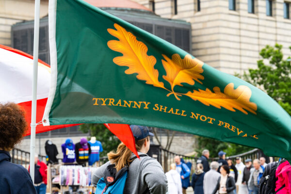 Protester with a Tyranny Shall Not Prevail flag at a No Kings protest.Despite warnings from the law enforcement not to attend today’s No Kings rally after this mornings shootings of Minnesota lawmakers with the killer on the lose, the No Kings Rally is happening at the Minnesota State Capitol in St. Paul. Protester with a Tyranny Shall Not Prevail flag at a No Kings protest.Despite warnings from the law enforcement not to attend today’s No Kings rally after this mornings shootings of Minnesota lawmakers with the killer on the lose, the No Kings Rally is happening at the Minnesota State Capitol in St. Paul.