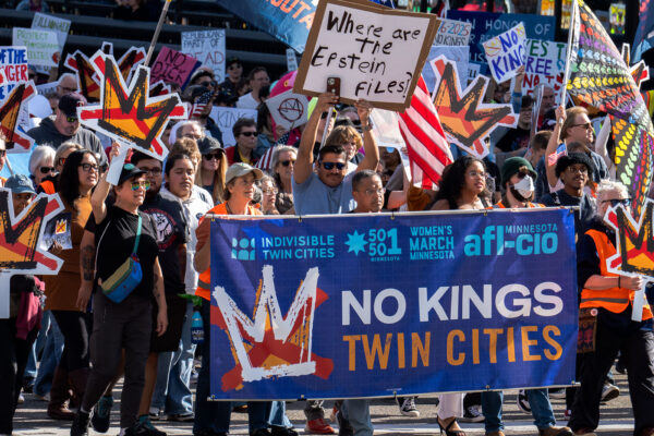 Minnesota Attorney General Keith Ellison holding the banner and marching at No Kings in Downtown Minneapolis.Thousands protest in Downtown Minneapolis on Saturday October 18, 2025 as part of nationwide “No Kings!” protest. Minnesota Attorney General Keith Ellison holding the banner and marching at No Kings in Downtown Minneapolis.Thousands protest in Downtown Minneapolis on Saturday October 18, 2025 as part of nationwide “No Kings!” protest.