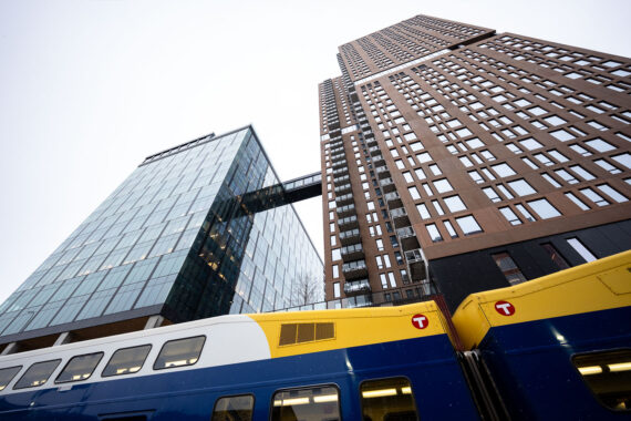 A Northstar Train below the North Loop Green buildings in Downtown Minneapolis. A Northstar Train below the North Loop Green buildings in Downtown Minneapolis.